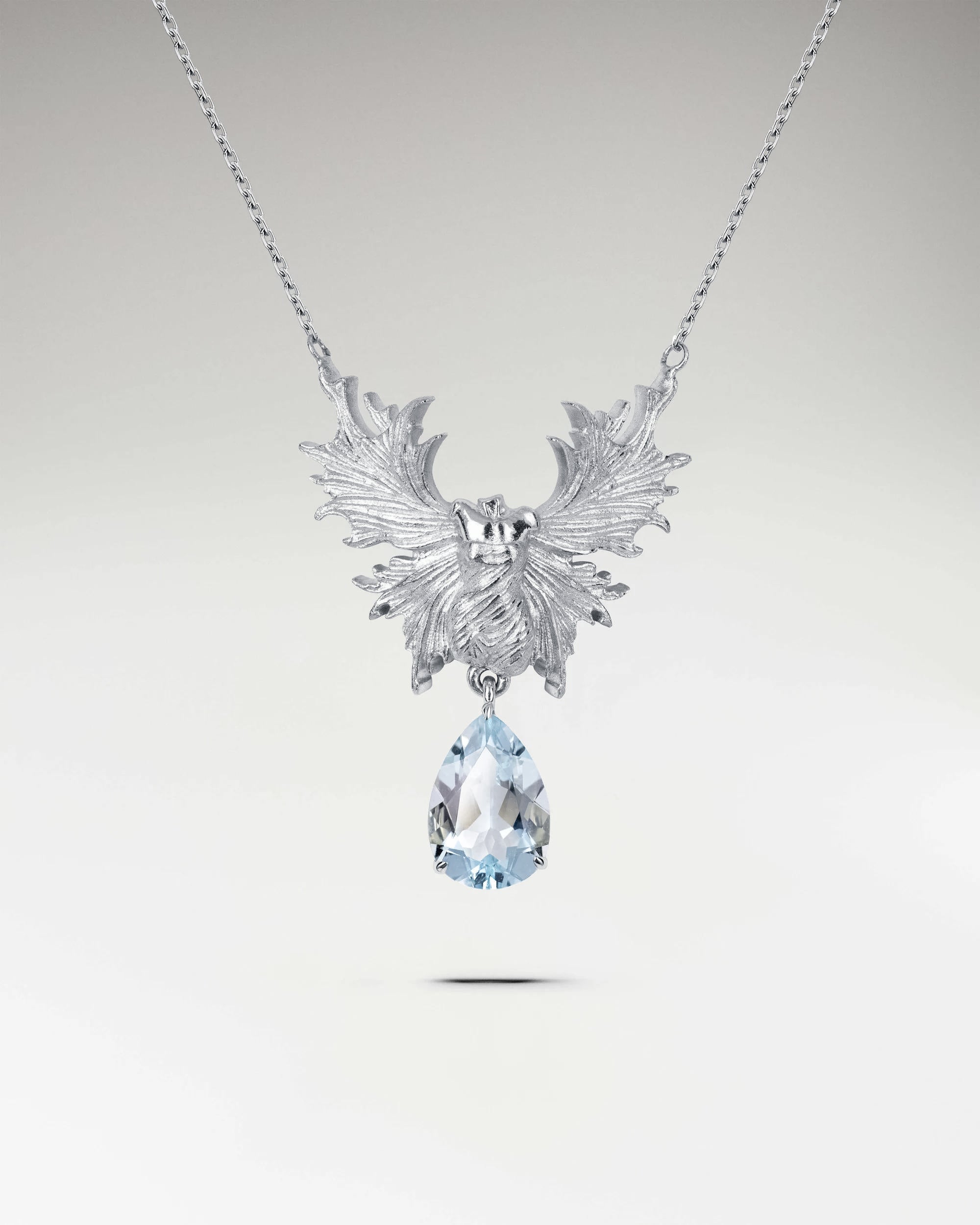 Collar de ángel de la guarda en plata de ley con topacio azul