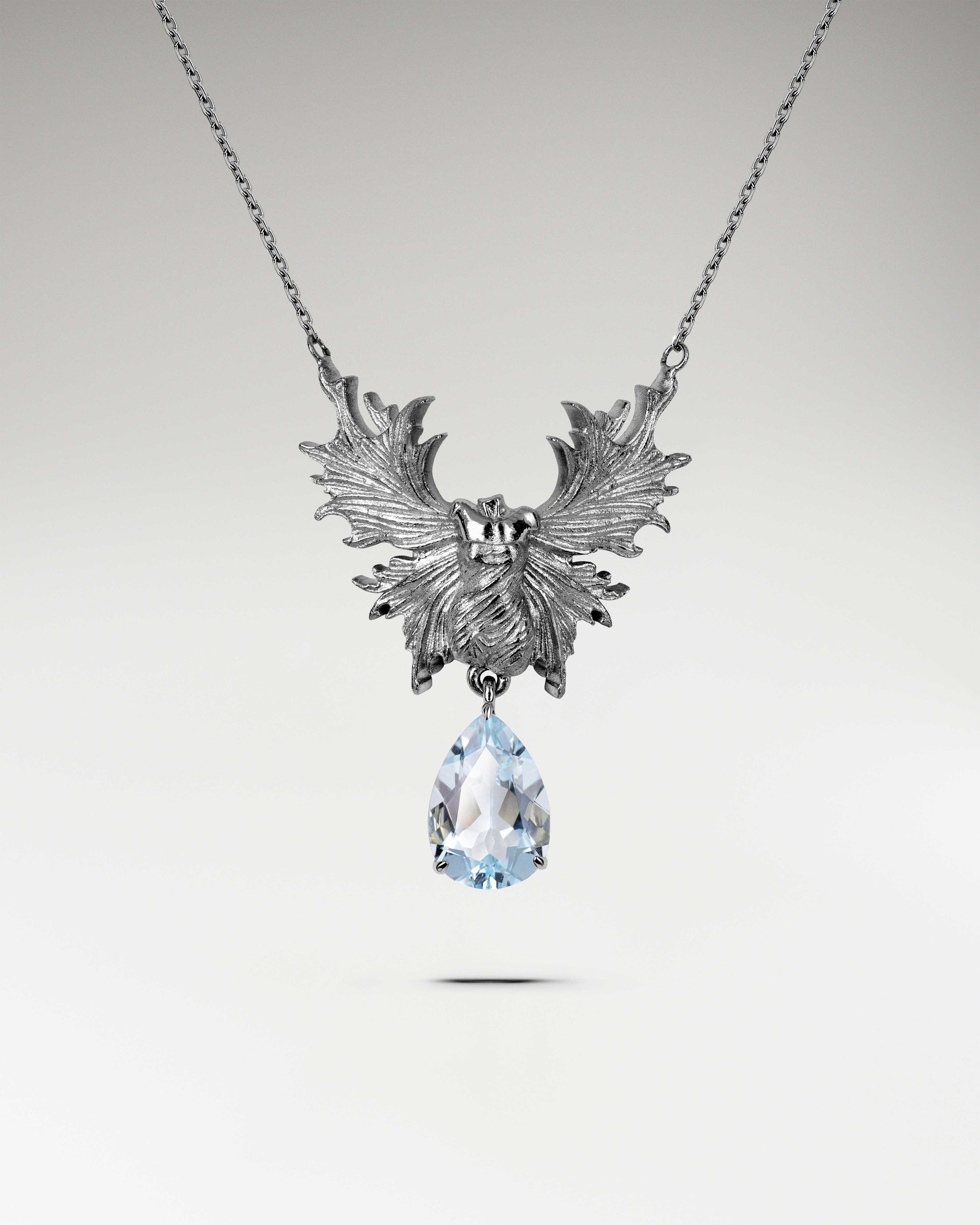 Collar de ángel de la guarda en plata de ley con topacio azul