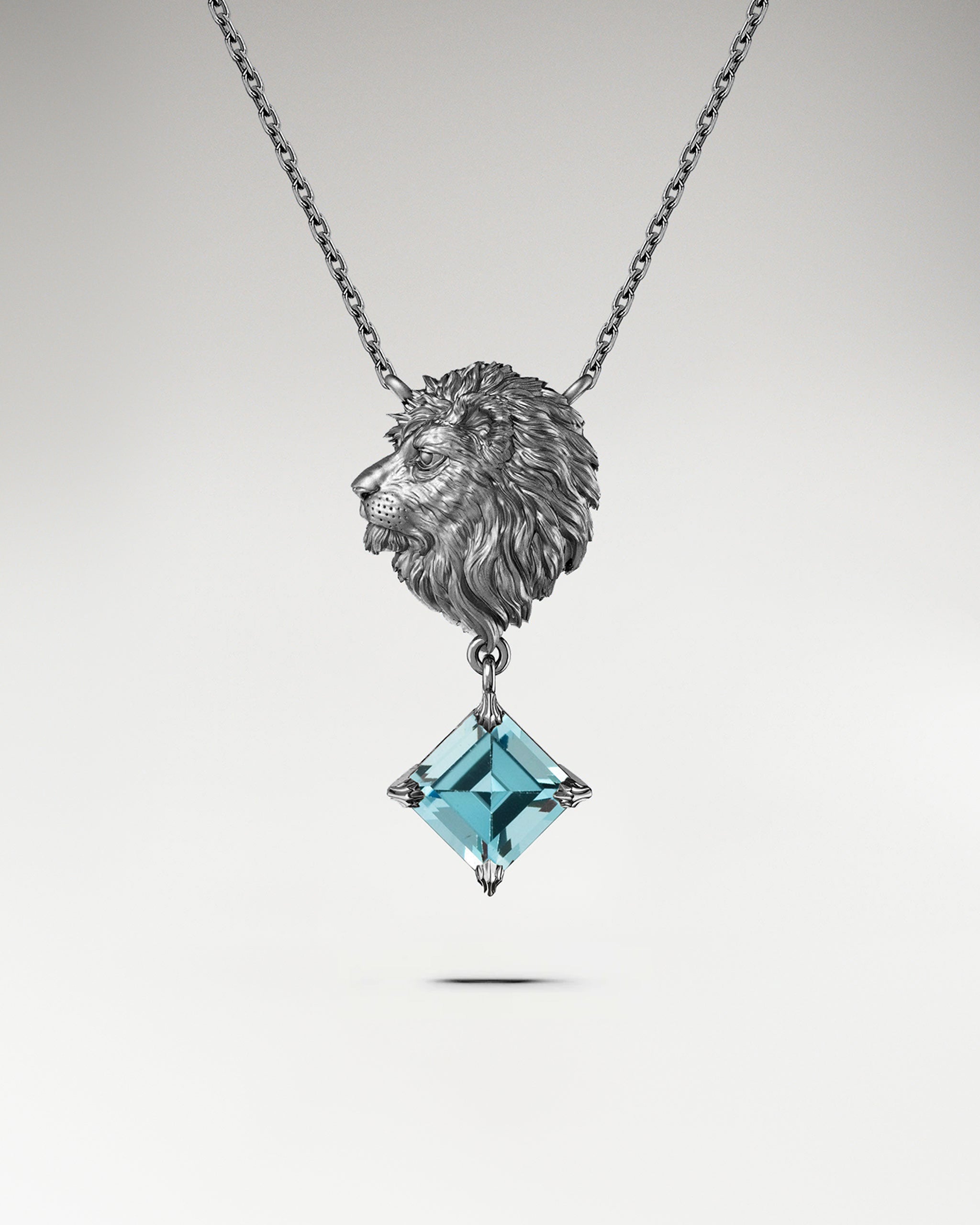 The Leo Pendant Necklace In Sterling Silver With Topaz