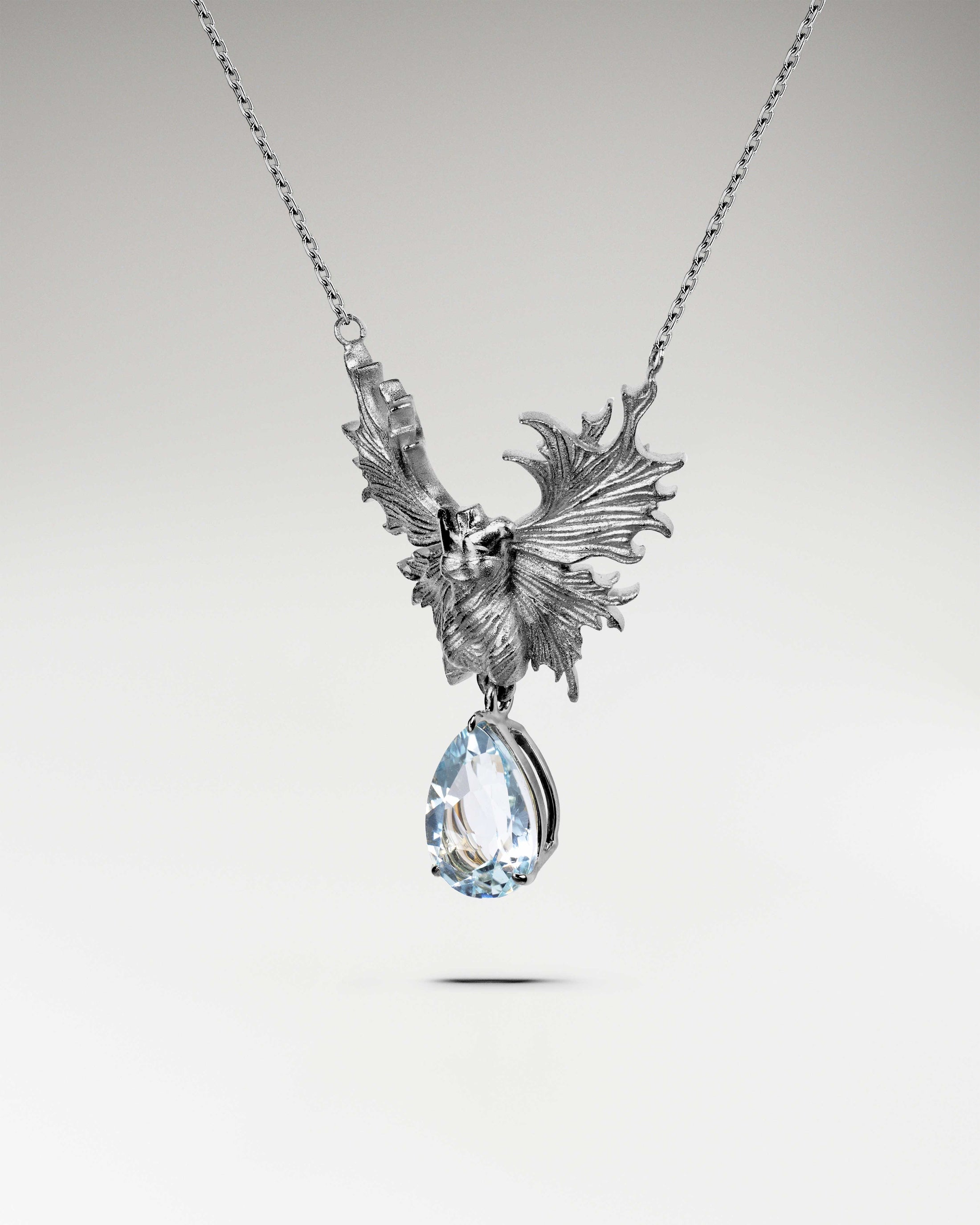 Collar de ángel de la guarda en plata de ley con topacio azul