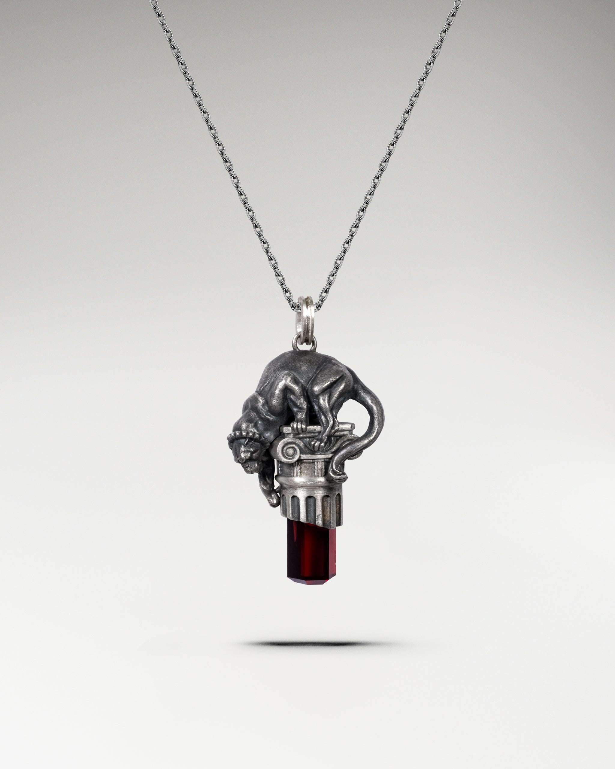 Panther's Gaze Pendant Necklace In Sterling Silver And Garnet