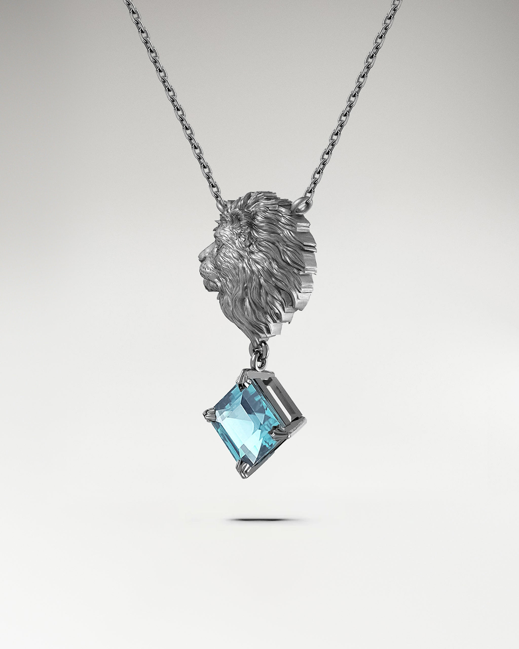 The Leo Pendant Necklace In Sterling Silver With Topaz