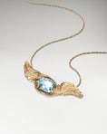 Load image into Gallery viewer, Feather Embrace Pendant Necklace In Sterling Silver With Topaz
