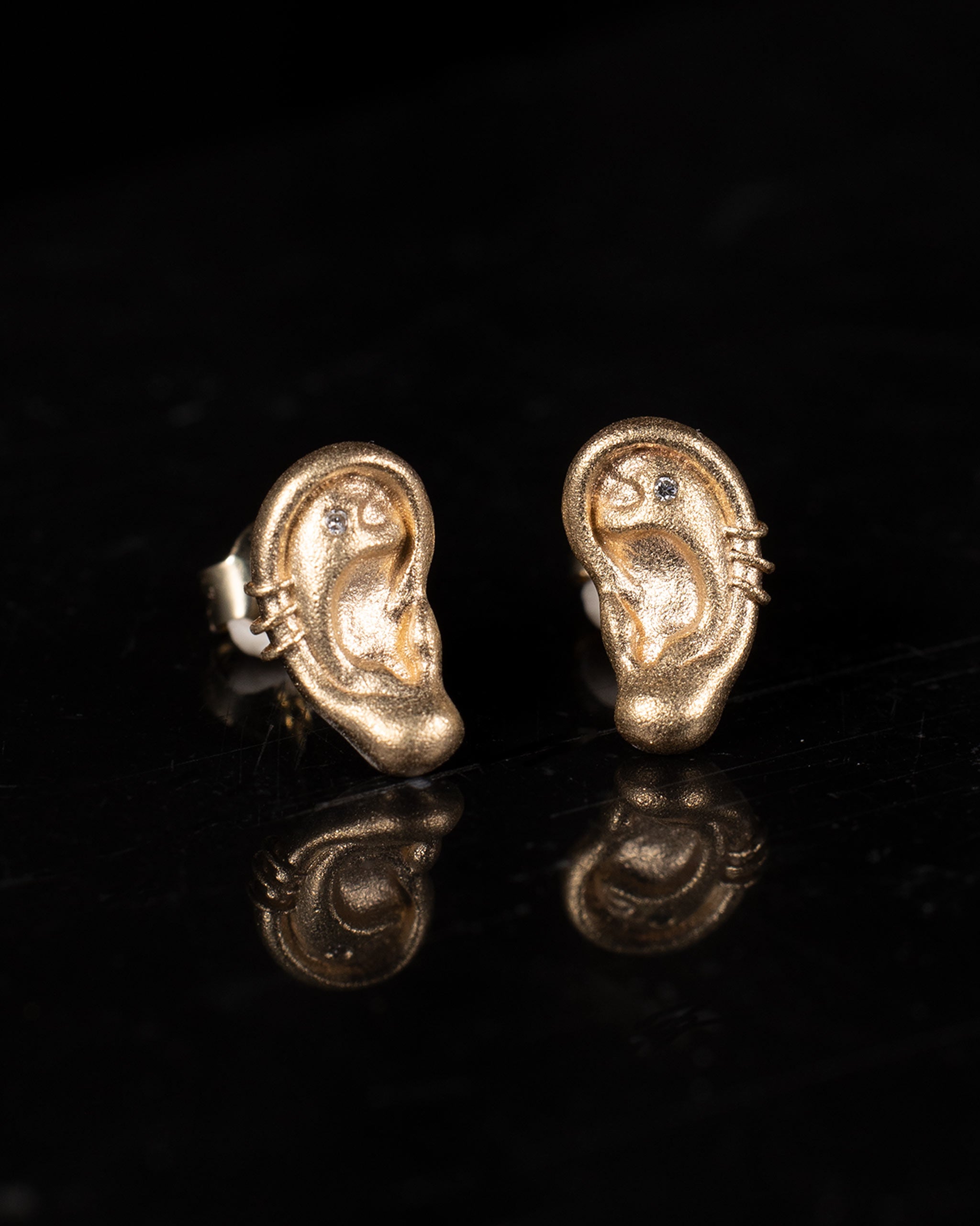 Ear Shapped Diamond Studs in 10k Gold