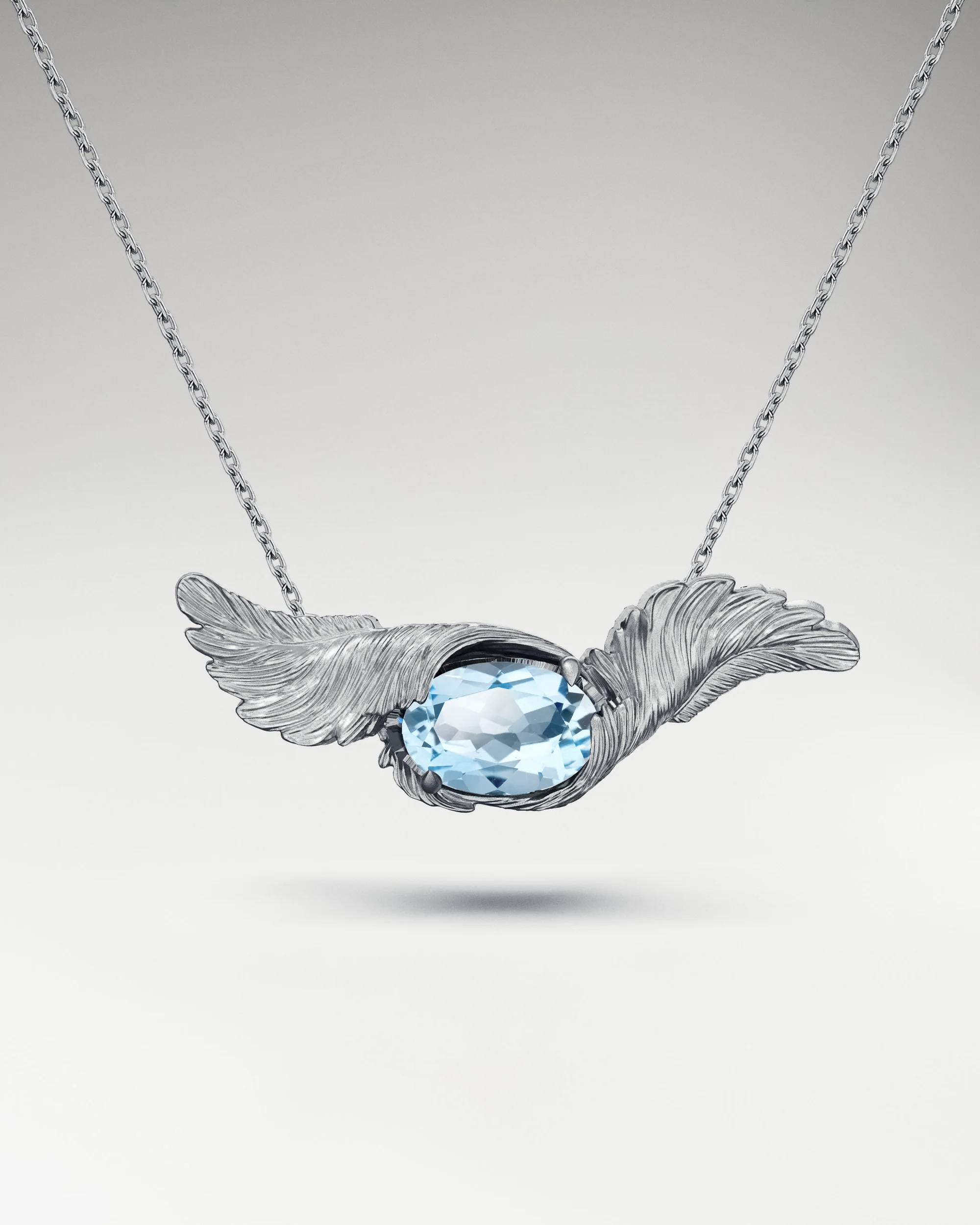 Feather Embrace Pendant Necklace In Gold With Aquamarine