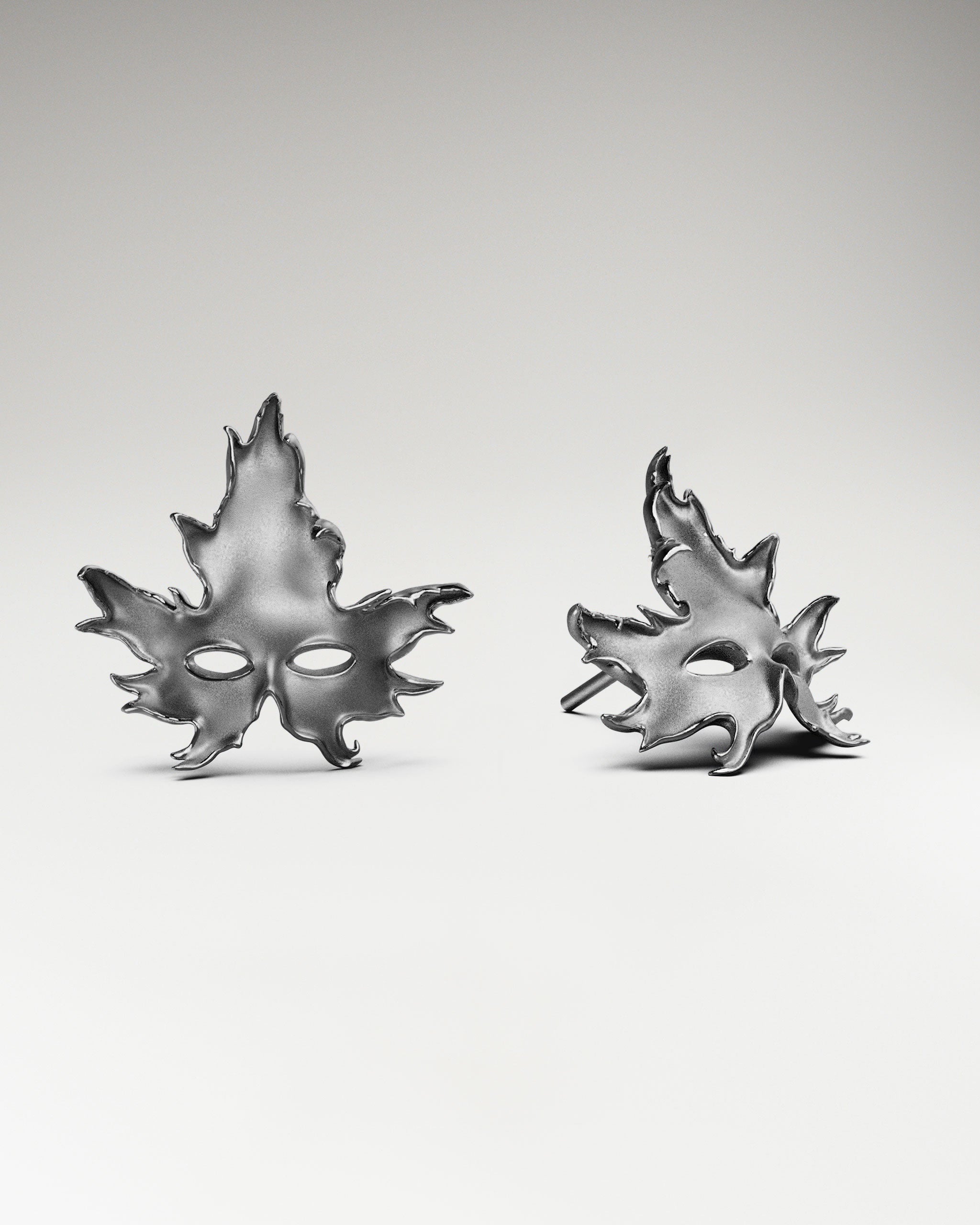 Maple Leaf Mask Stud Earrings In Gold